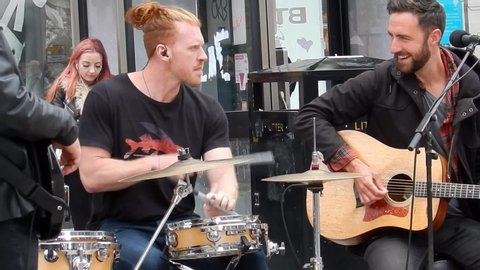 Liverpool / United Kingdom (UK) - 06 19 2019: Keywest Irish pop folk band performing promotion busking in city street event.