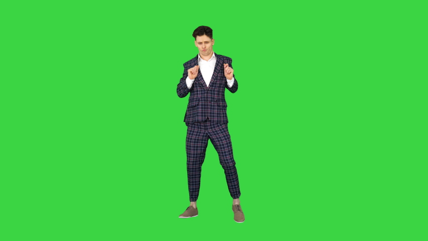 Happy Successful Businessman Dancing In a Crazy Way on a Green Screen, Chroma Key. | Shutterstock HD Video #1036333886