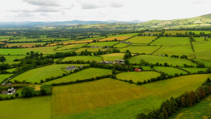 Aerial drone view of Irish countryside and farmlands near the Carlow in Dublin county, Ireland. Rural Irish landscape.