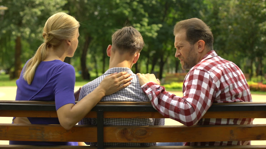 caring mother dad supporting sad teen Stock Footage Video (100% Royalty ...