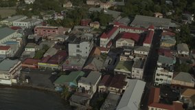 Aerial view of multicolor buildings at waterfront / Grenville, Grenada