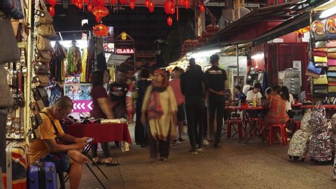 Petaling Street, Malaysia - 3 September 2019, Timelapse view of crowded people walking in night market at Petaling Street.