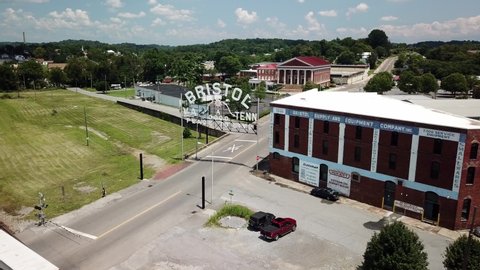 Bristol , Tennessee / United States - 07 31 2019: Aerial push in over Bristol Tennessee State Line with Virginia Sign