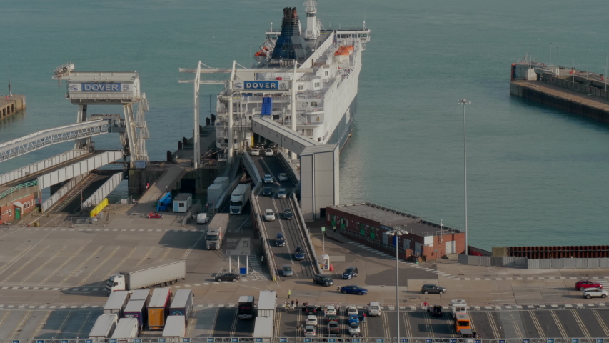 A ferry between France and United Kingdom unloads goods and passengers in port of Dover. This port is a critical point for Brexit discussions.