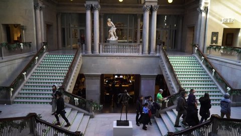 Chicago , illinois / United States - 11 24 2018: Visitors at the main hall with the stairs in the Chicago Art Institute