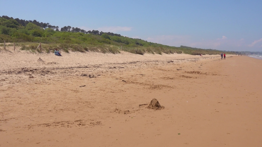 NORMANDY, FRANCE - CIRCA 2018 - Establishing of Omaha Beach, Normandy, France, site of World War two D-Day allied invasion.