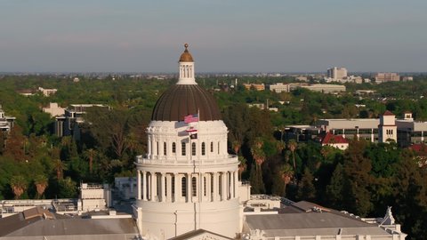 Aerial video of downtown Sacramento California on a beautiful sunny day with a zoom lens. May 2019