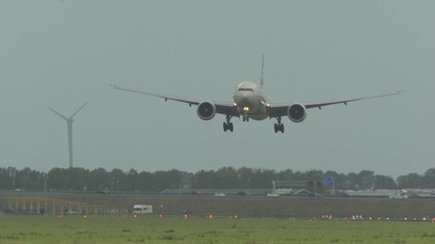 Amsterdam/Netherlands  06/23/2019  video of commercial airplane landing in storm in Amsterdam Airport Schiphol
