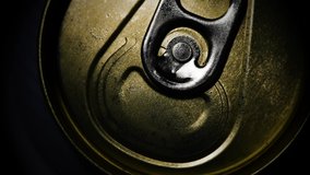 Close up beer can rotate isolated on black. The soda can show light, shadow, shape and texture. Lighting in studio. - Video 4K
