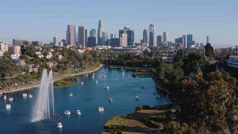 Los Angeles downtown skyline with palm trees in park district, California