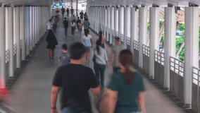 4k Time lapse, Many people walk on the sidewalk in the business district of Bangkok, Thailand. Group of people walking Time lapse footage video 4k. Footage b roll economic crisis coronavirus spreader