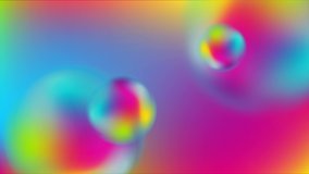 Colorful holographic 3d blurred spheres balls on same background. Abstract liquid circle shapes retro futuristic motion design. Seamless looping. Video animation Ultra HD 4K 3840x2160