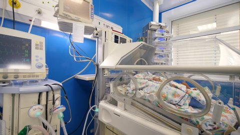 Medical unit with modern equipment and a baby in the incubator