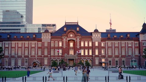 Tokyo, Japan – August 17 2018: Timelapse video of sunset on the Marunouchi side of Tokyo railway station in the Chiyoda City, Tokyo, Japan. 