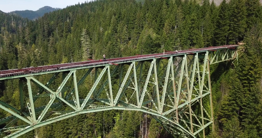 Cinematic Aerial of Old Deserted Vance Creek Bridge in Washington State USA. Abandoned and Unsafe