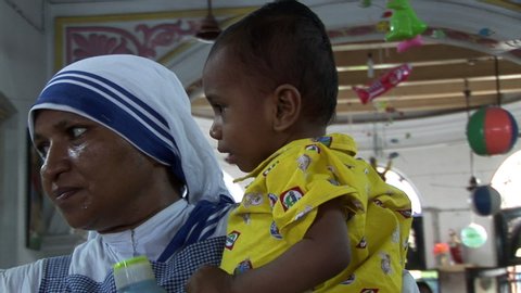 Calcutta / India - 08 09 2019: Orphaned babies are looked after by volunteers at a orphanage founded by Mother Teresa