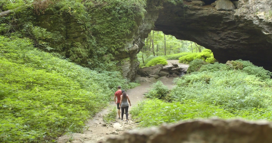 Couple Hiking, Exploring Outside the Maquoketa Caves Park in Iowa