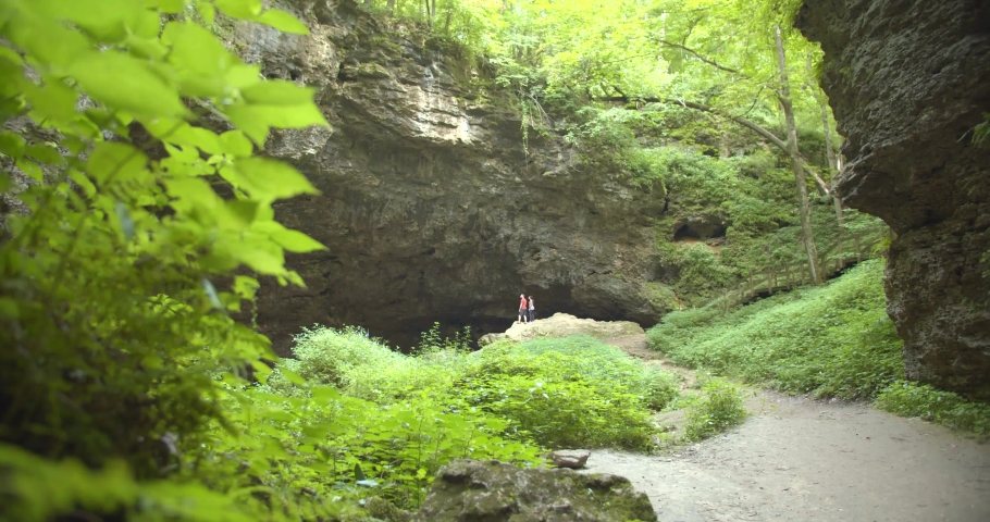 Couple at the Entrance to the Maquoketa Caves, State Park in Iowa