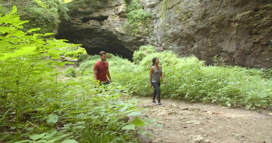 Couple at the Entrance to the Maquoketa Caves, State Park in Iowa