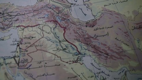 Closeup of a  map of Middle East countries 
, Globe with countries map in the Middle East in Arabic - location luxor - egypt 
4/9/2019