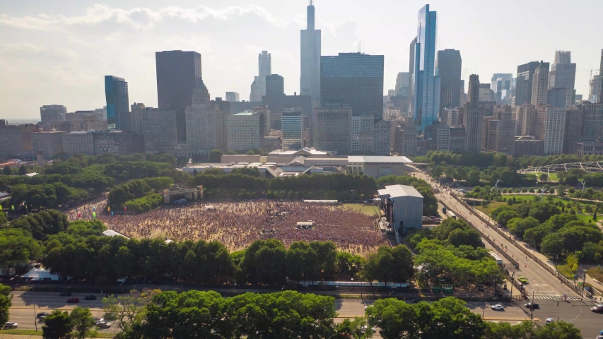 Chicago , Illinois / United States - 08 04 2019: Aerial Hyperlapse Video of Crowd at Lollapalooza Music Festival in Chicago, Illinois