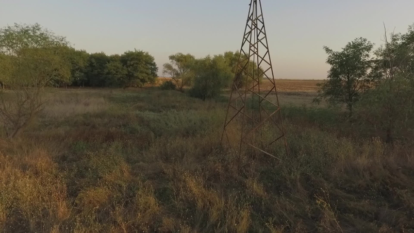 close up of an old lonely windmill in a meadow