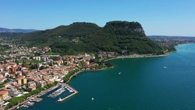 Panoramic view of the resort town of Garda the north of Italy. Aerial video with drone. Rocca Del Garda.