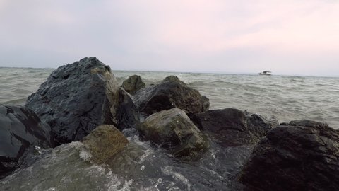 rock and waves , summertime sea scene