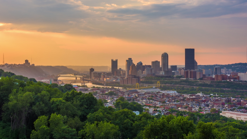 Pittsburgh, Pennsylvania, USA downtown skyline from the south side from dusk to night.