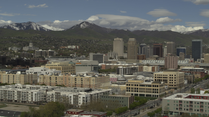 Aerial view of urban cityscape near mountain range / Salt Lake City, Utah, United States