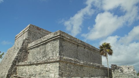Wind blowing near ancient Mayan stone ruins / Tulum, Quintana Roo, Mexico
