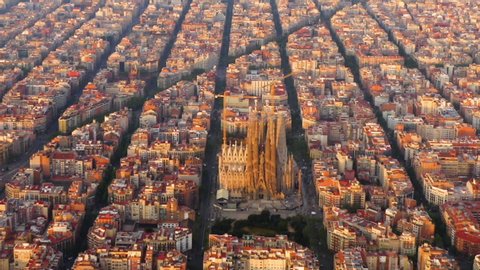 Barcelona , Catalunya / Spain - 07 01 2019: Cityscape of Sagrada Familia and the city at sunrise