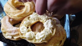 Delicious cottage cheese ring with powdered sugar slow motion - Powered by Shutterstock - Get 15% off with code: PIKWIZARD15