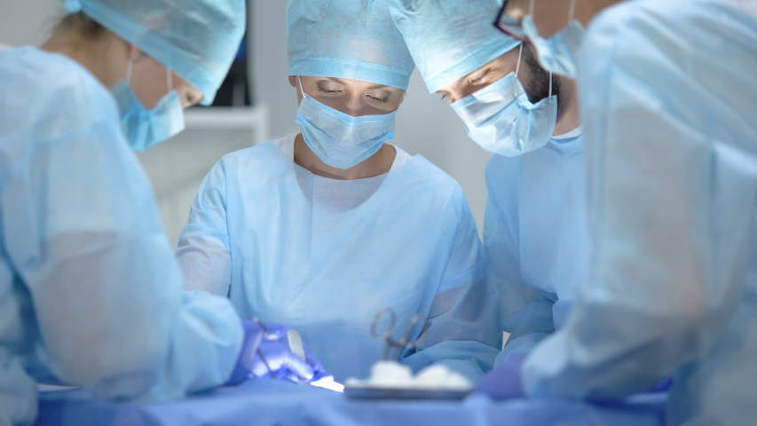 serious surgeon team performing cardiothoracic surgery Stock Footage ...