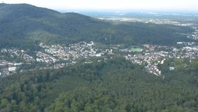 Aerial view of the city Baden-Baden in Germany on a sunny morning in summer. Pan to the right to the start of Baden-Baden.