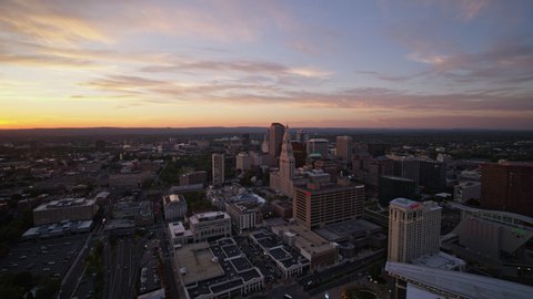 Hartford Connecticut Aerial v2 Panning view over downtown buildings at sunset - October 2017