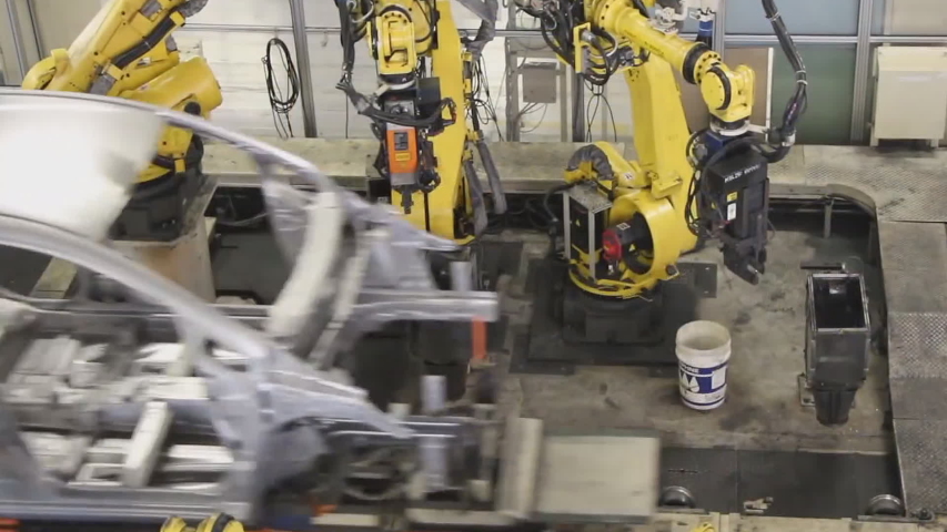 industrial robots cook a car body Royalty-Free Stock Footage #1036625801