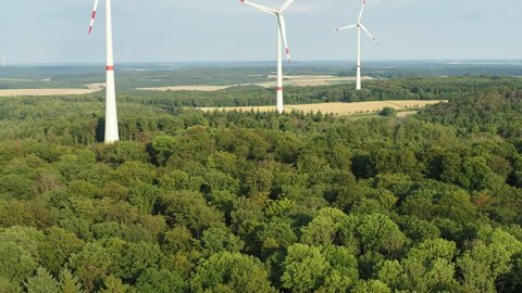 Drone flight of Wind farms in the forest