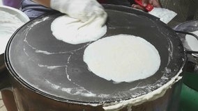 Thai cotton candy burrito pancake for sale at market in Ayutthaya, Thailand. Roti Silk. footage video 4k.