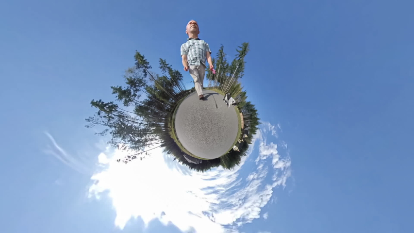 Man walking his dog on a tiny planet