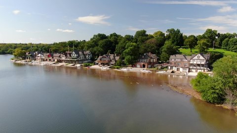 Philadelphia , PA / United States - 08 10 2019: Aerial dolly shot of Boathouse Row along Schuylkill River and Fairmount Park