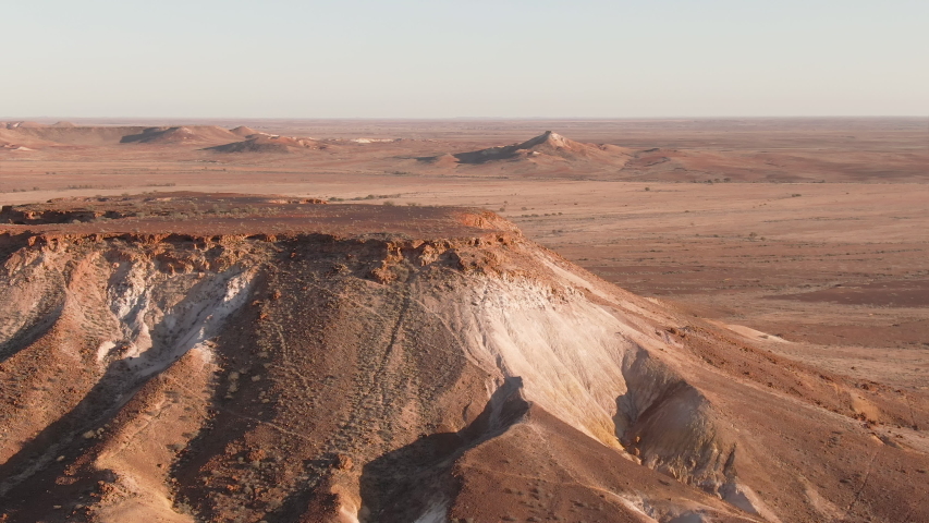 Aerial: Inspiring footage of the Breakaways, tourism scenic spot outside of Coober Pedy in the Australian Outback.