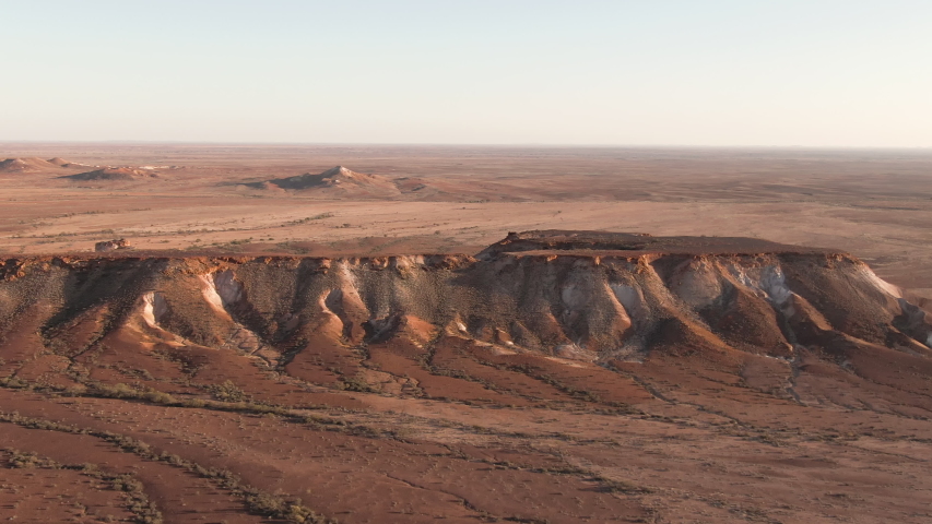 Aerial: Inspiring footage of the Breakaways, tourism scenic spot outside of Coober Pedy in the South Australian Outback.