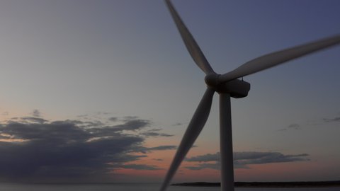 Windturbines during sunset on the island Neeltje Jans, the Netherlands. Aerial shot.