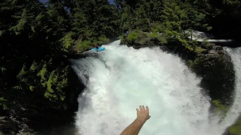 Belknap Springs , Oregon / United States - 06 30 2017: Sahalie Falls Waterfall kayaking and highlining