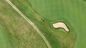 Aerial video of the Golf court, club. Lawnmower, Flatley