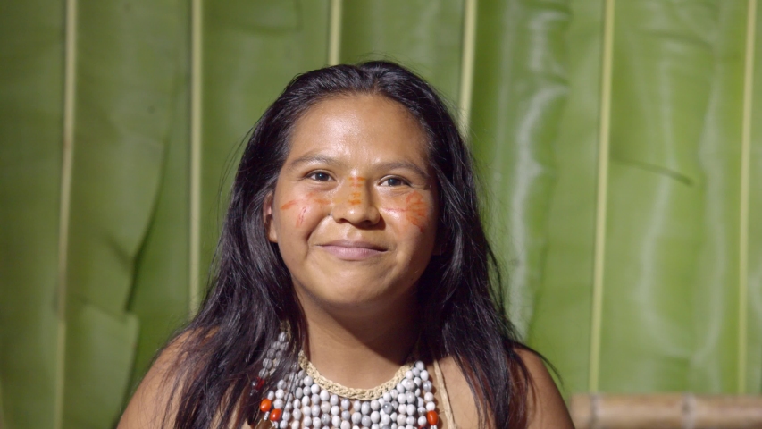 young girl giving the finger to the viewer as a response to an insult or something unpleasant in ecuador