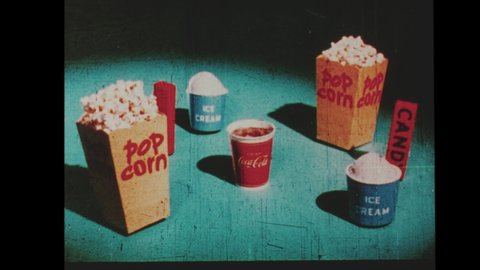 1960s  Animated Snack-Bar Advertisement that was Featured at Drive In Theater. A Young Boy Excited About the Pop Corn, Hot Dogs, Ice Cream and Coca-Cola from the Refreshment Counter at Intermission.