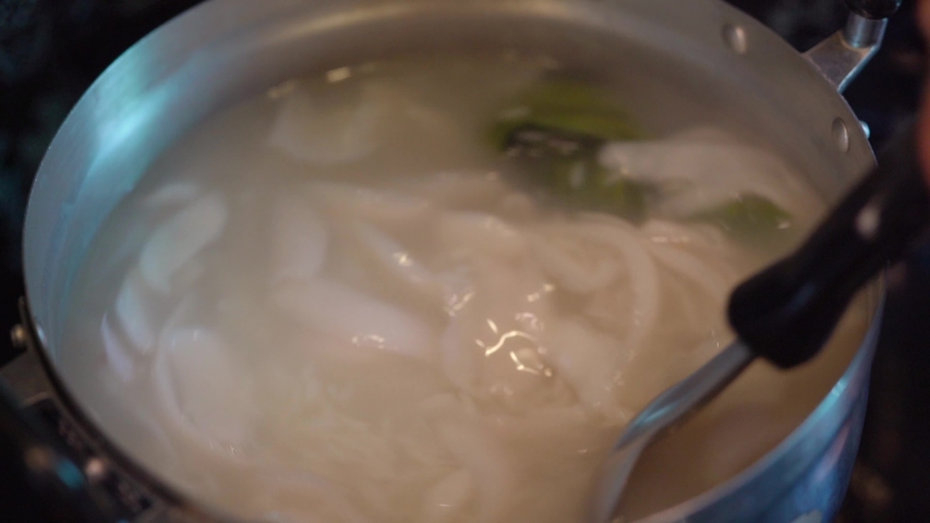 Making sweet sticky rice with longan fruit and coconut milk slow motion ...