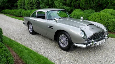 Greenwich, CT/United States - July 31, 2019: gorgeous static views of the famous 1964 James Bond Aston Martin car.  This is the actual car that was used in the movies and sold at auction for over $6 m